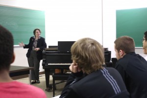 Carol teaching at the College of the Holy Cross, 2014